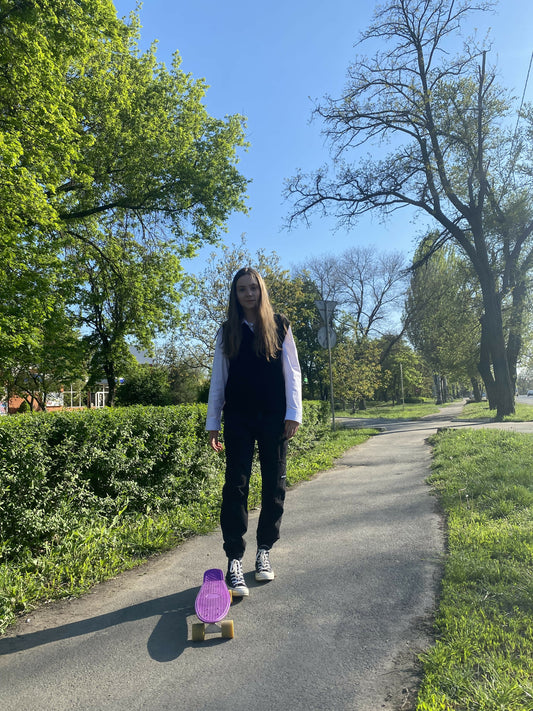 girl with a skateboard on the street